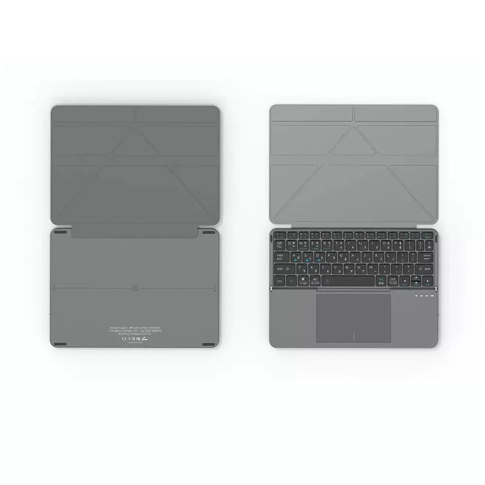 Grey folding Bluetooth wireless keyboard for mobile phones and tablets showing compact folded design