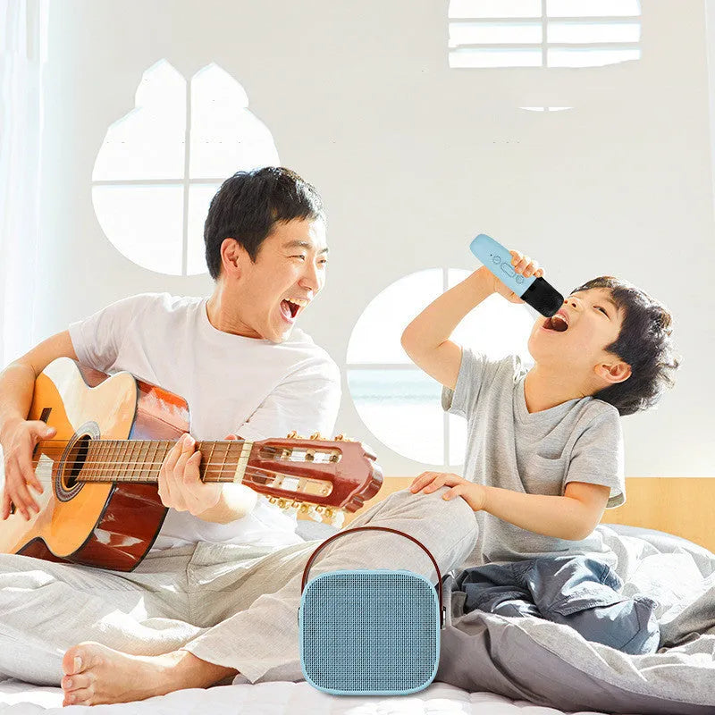 Compact white, pink, or blue portable Bluetooth speaker with microphone for hands-free calls.