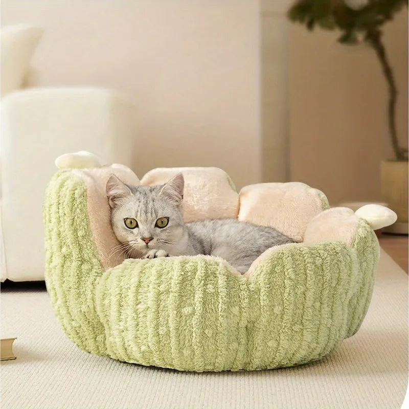 Green cactus print soft cat litter mat for pets next to a litter tray.