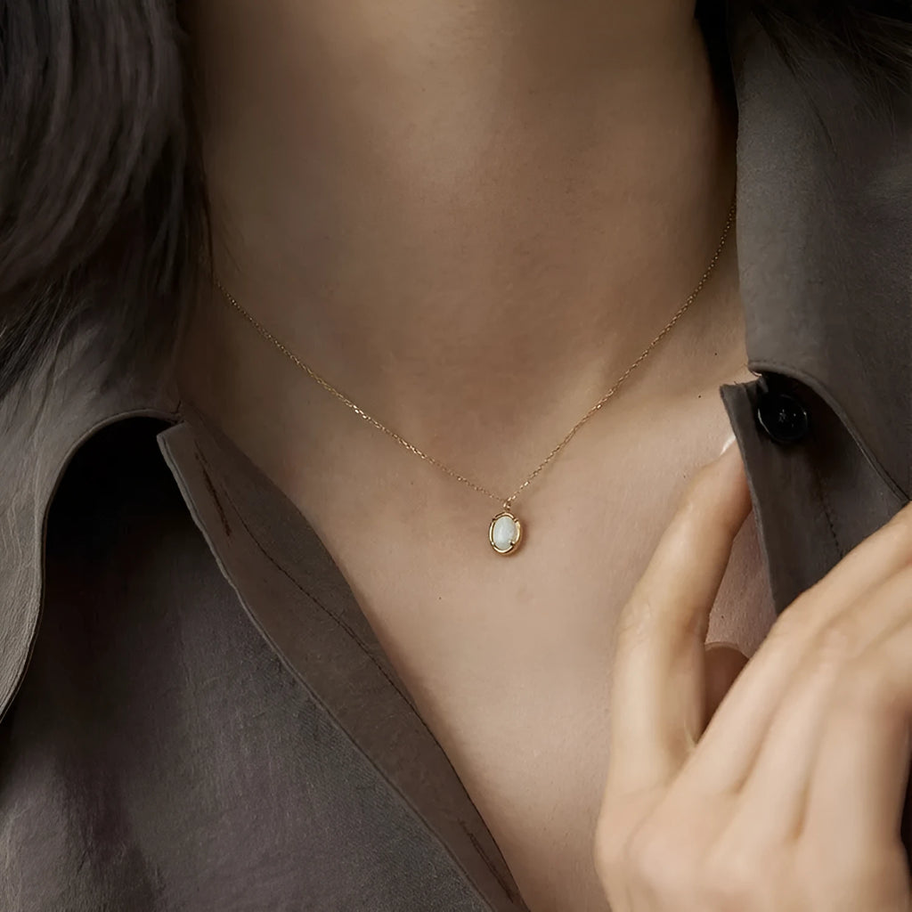 Oval jelly opal pendant necklace in silver with gold or white gold plating