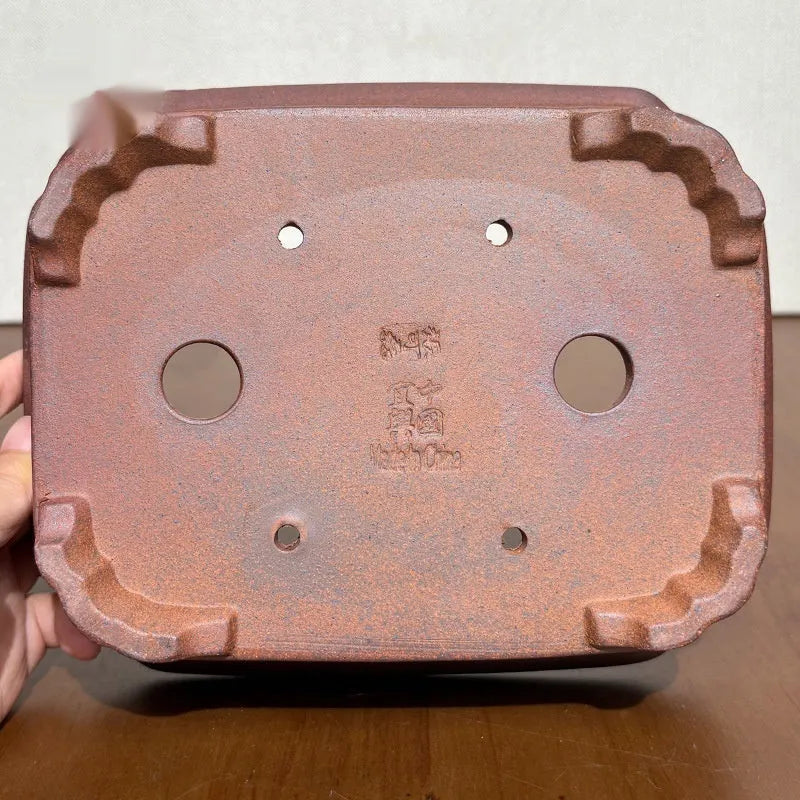 Rectangular stoneware flower pot in reddish brown with hand-glazed finish and 17cm base, for bonsai or firewood display.