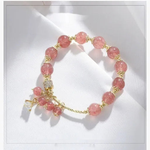 Pink crystal women's bracelet with heart-shaped strawberry quartz beads and natural pearl accents