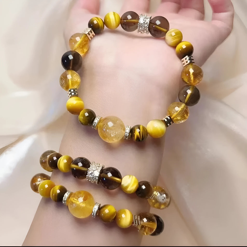 Yellow tower crystal bead bracelet with natural style on a wrist.