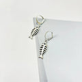 Retro fishbone pendant alloy earrings with O-shaped chain on model