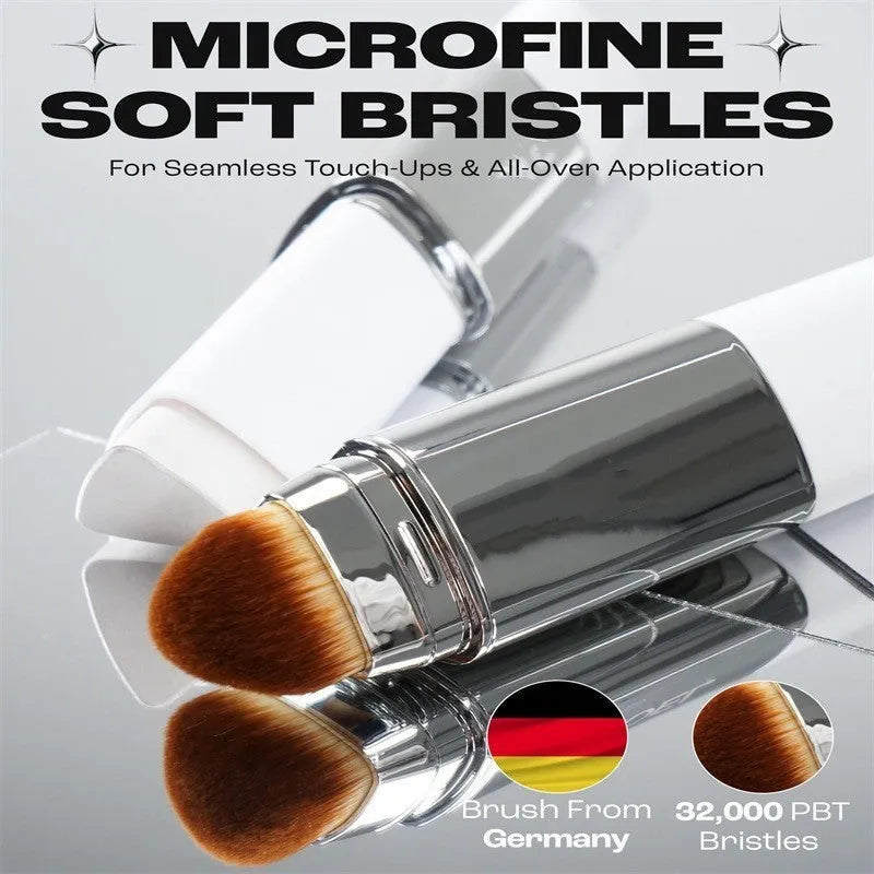 Blanc Cover cream stick foundation brush with a silver aluminium handle and a removable brush head.