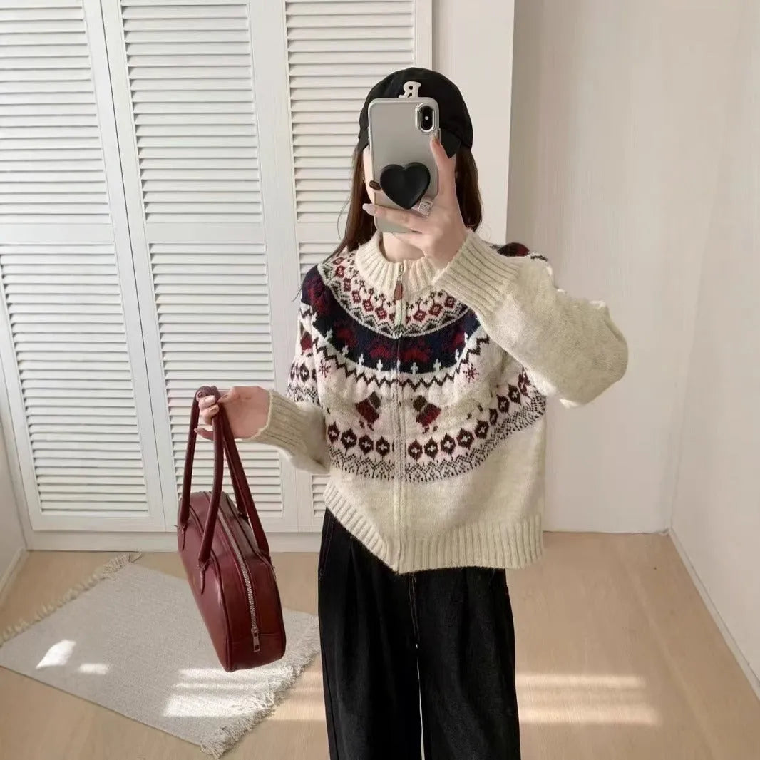 Apricot ethnic jacquard pullover sweater with 3D pattern, showing loose fit and long sleeves.
