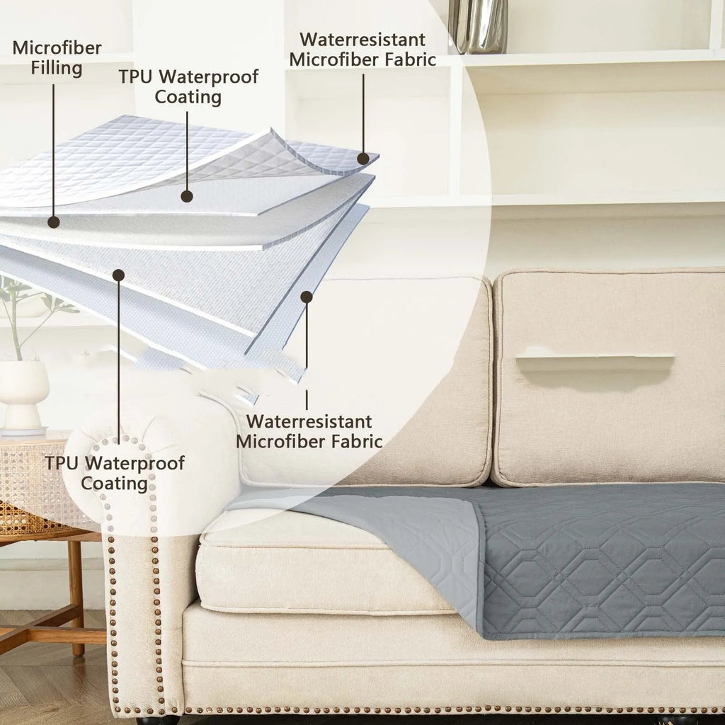 Reversible waterproof dog sofa cushion in khaki and beige, shown on a grey sofa.