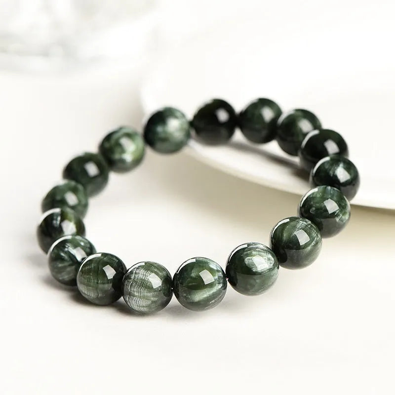 Green Dragon crystal bracelet with 8-9mm round beads showing Ruyi symbolism elements