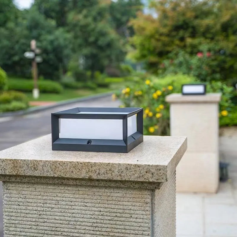Aluminium solar-powered LED column light for outdoor wall or door mounting.