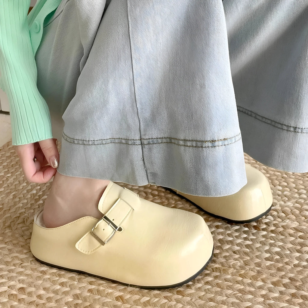 Flat buckle casual sneakers with round toe design in yellow, creamy-white, silver, and black colour options