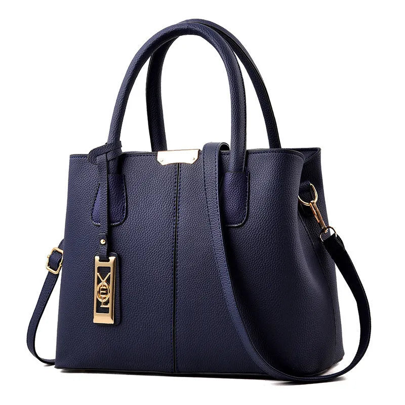 Soft PU leather women's shoulder bag in a horizontal square shape with a single strap.