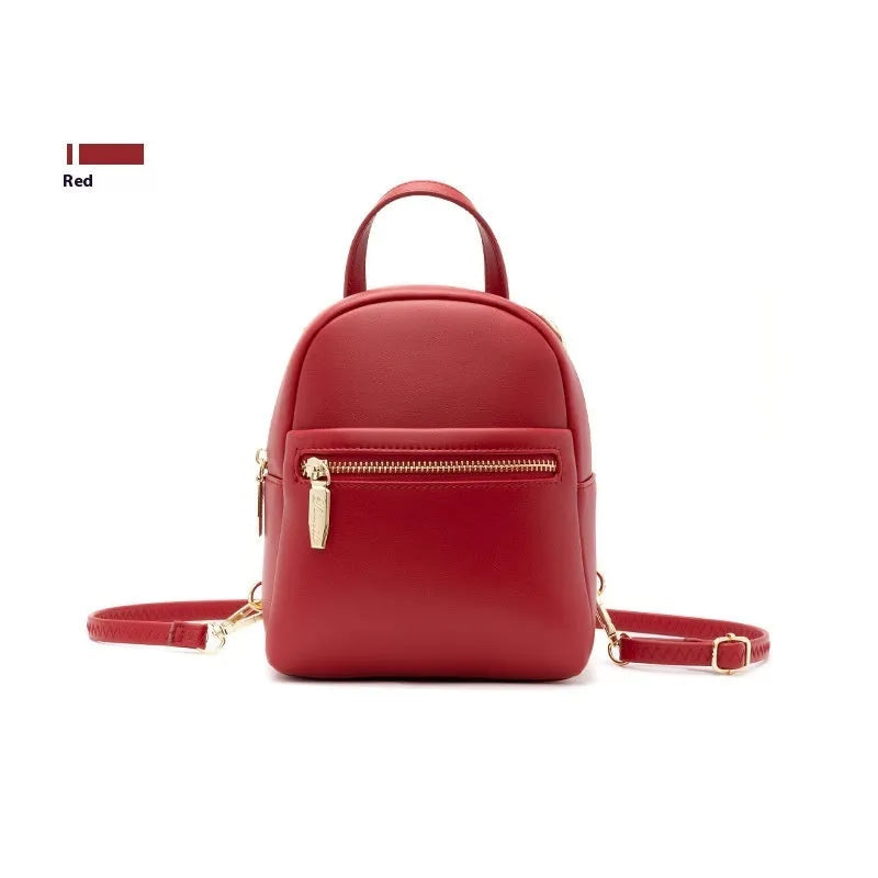 Soft PU mini backpack with three-dimensional pockets in six colour options including black, blue, pink, red, white, and yellow