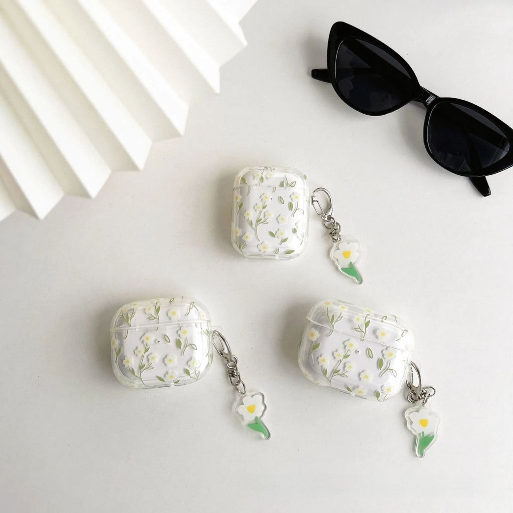 White floral decorative pattern on a high transparency TPU protective case for Apple AirPods.