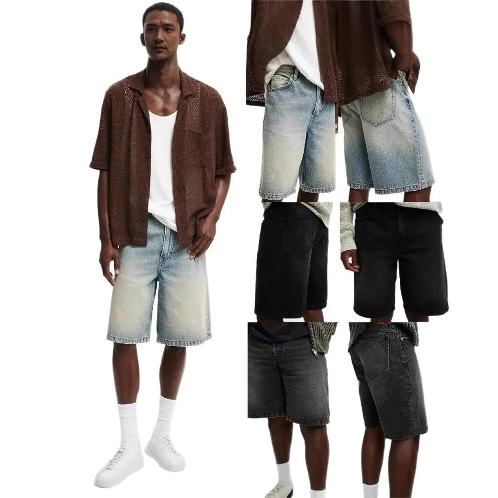 Men's loose straight-leg jeans in light blue denim on hanger