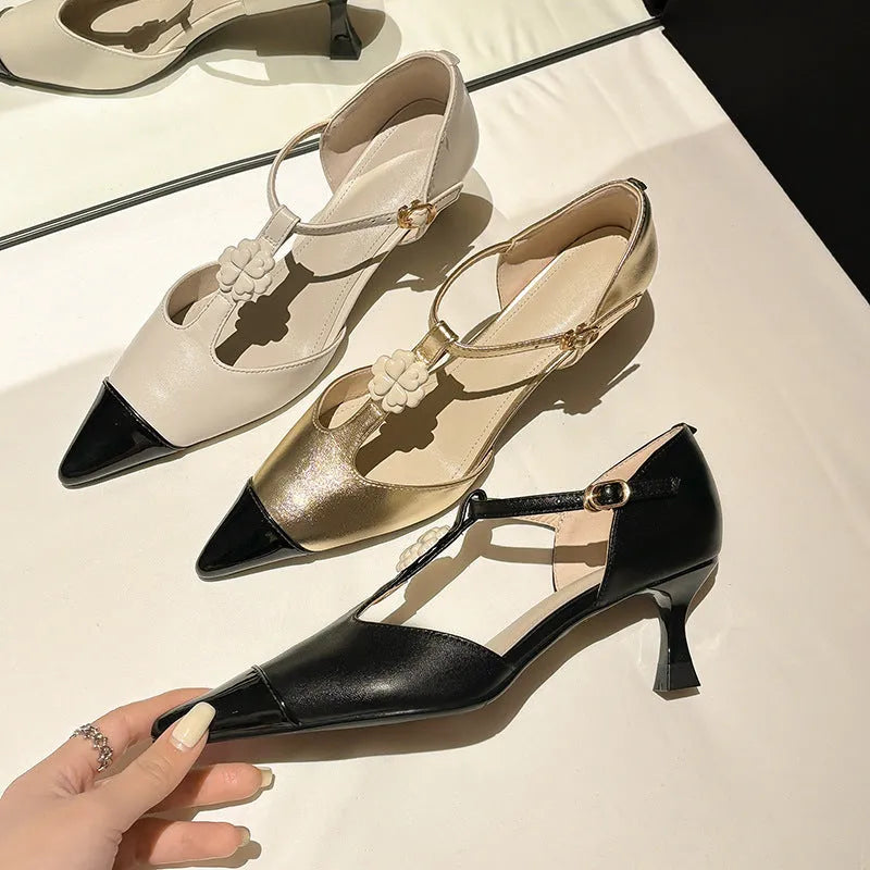 Women's pointed toe stiletto shoes with decorative flowers and buckles in black, gold, and milky white colours