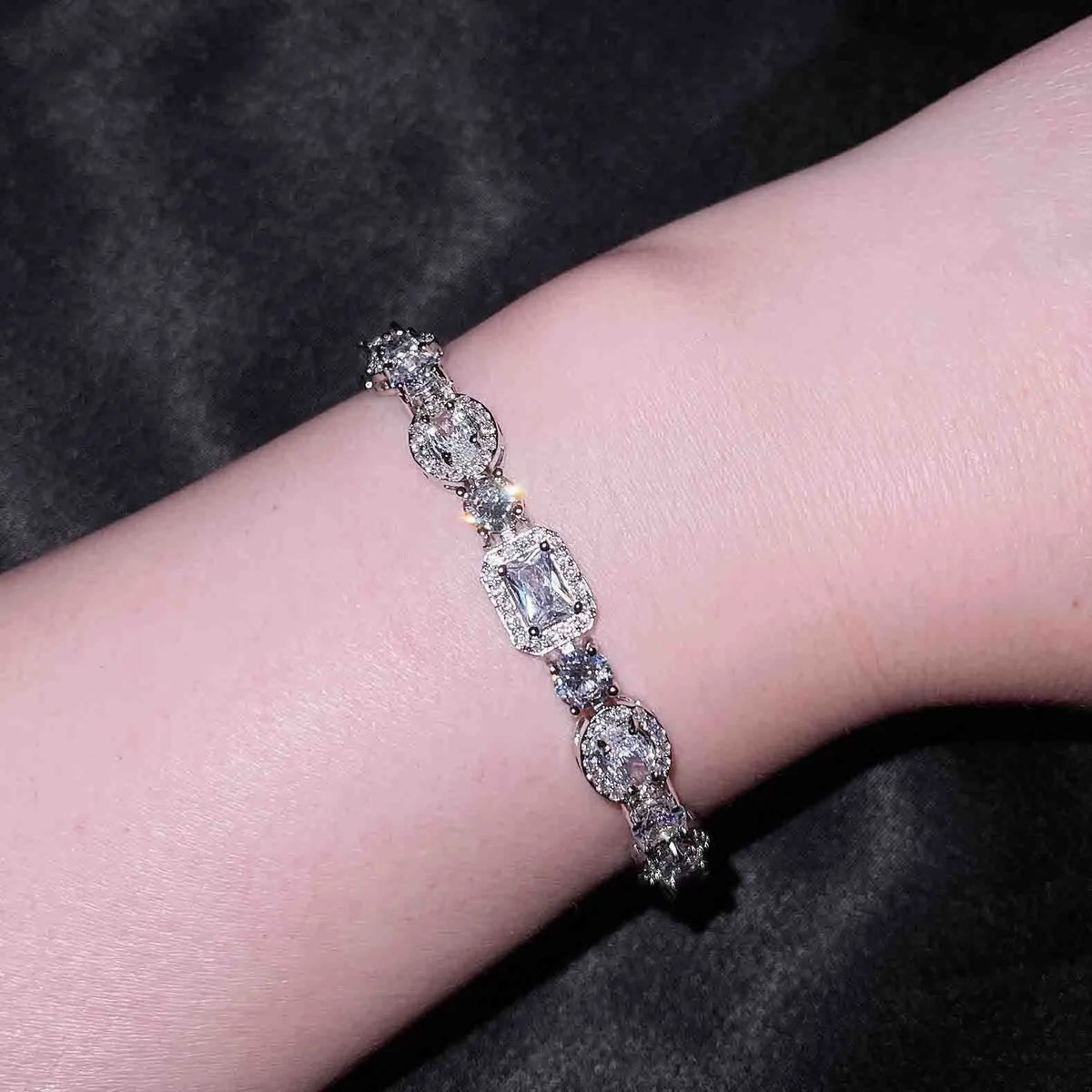 Women's geometric bracelet with zircon stones and sterling silver plating on white gold finish