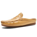 Men's black semi-slippers with a breathable artificial PU upper and a patterned rubber gommino sole.