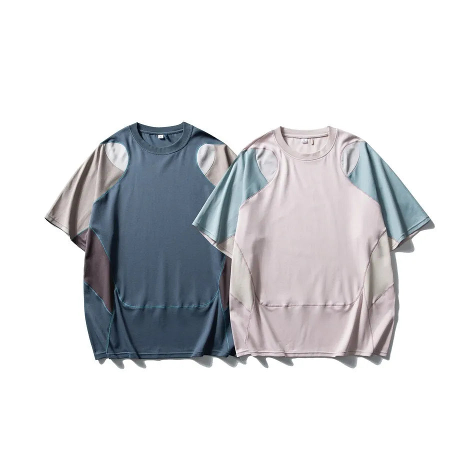 Men's loose blue patchwork t-shirt with contrast colour design and short sleeves.
