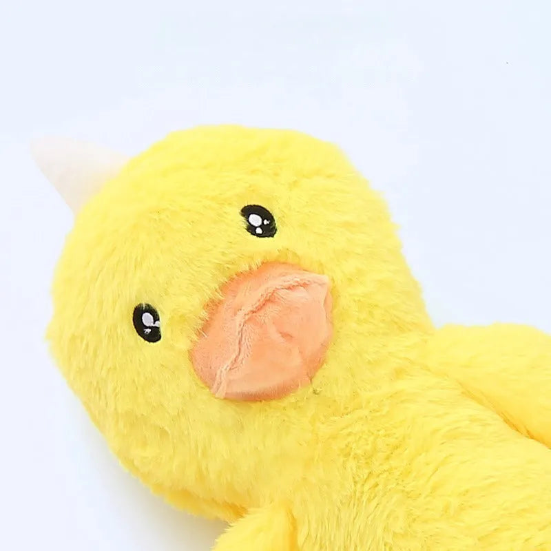 Large pink and yellow plush dog toy with squeaky rattle sounds for golden retrievers