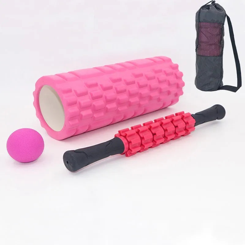 Black foam massage roller stick with six gear segments, 33cm long.