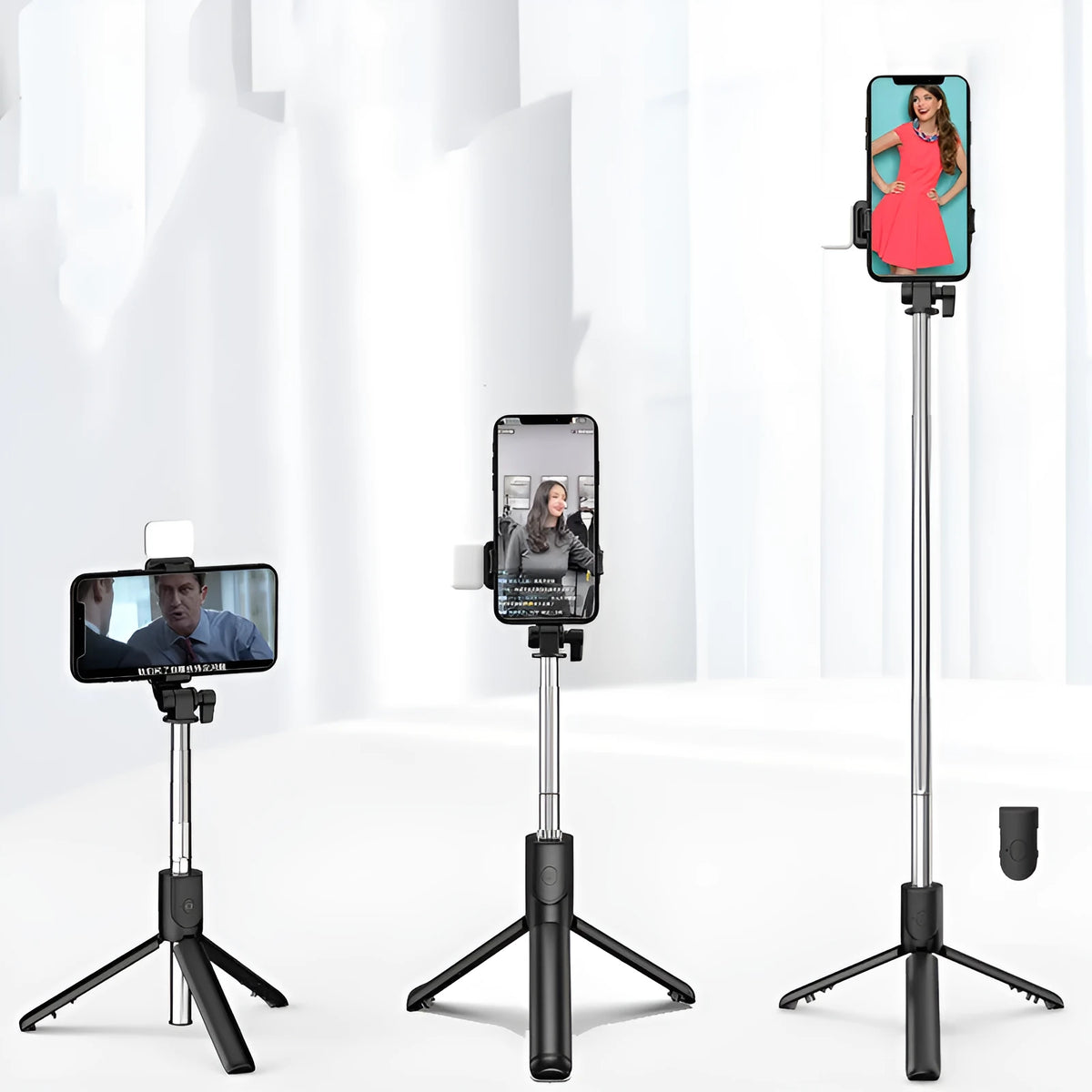 Aluminium Bluetooth selfie stick and tripod phone holder in black, pink, green, or white.