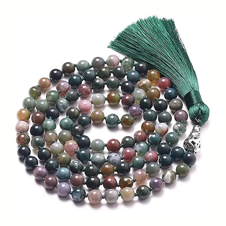 Long colourful agate and amethyst bead necklace with tassel detail, showing geometric pattern.