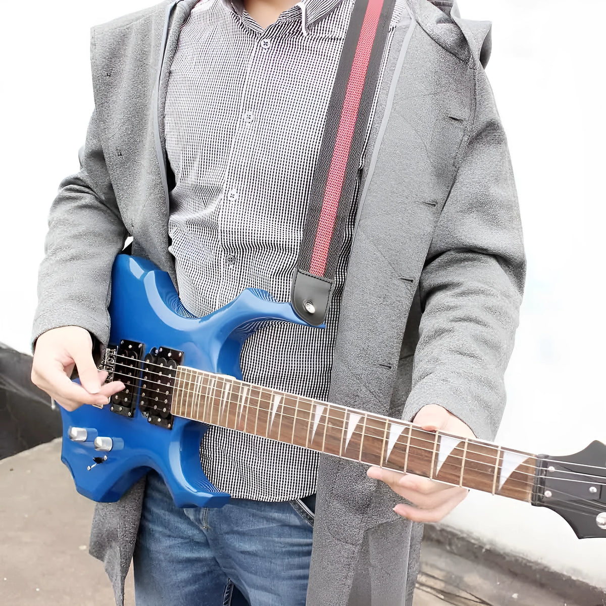 Woven fabric crossbody instrument strap for guitar, bass, and ukulele shown in multiple colour options