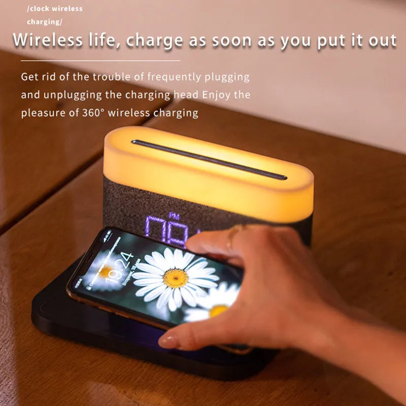 Black and white wireless charging desktop clock with integrated night light and digital display