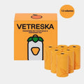 Portable dog waste bag capsule dispenser with scented refill bags in strawberry, orange and cherry blossom fragrances