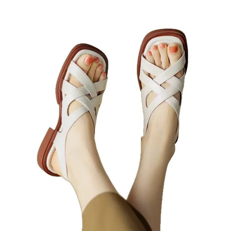 Women's glossy patent leather sandals with square toe and ankle strap in black, white, or brown
