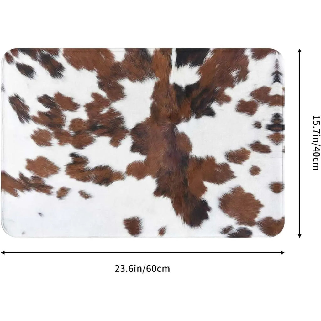 Personalised flannel floor mat showing brown cow print design in a square shape on a wooden floor.