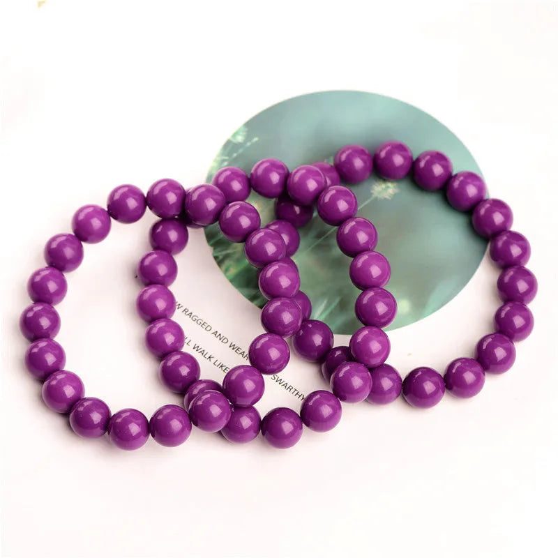 Jiuya polished crystal purple mica bracelet showing beads in an original design on a wrist.