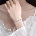 Blue diamond heart pendant necklace and bracelet set with mixed gem inlay on electroplated copper chain