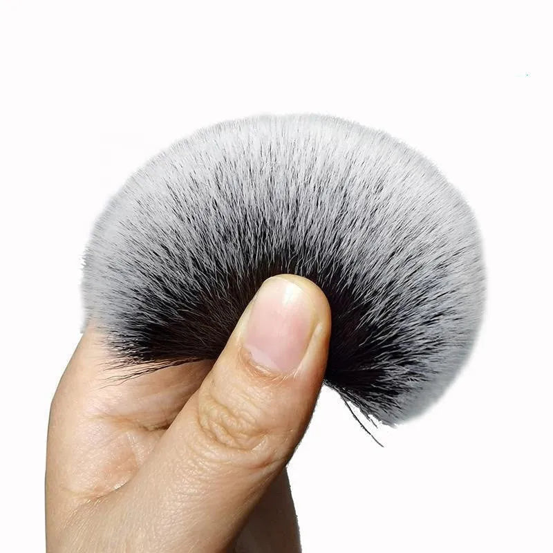Black car detailing brush with super soft pig hair bristles shown in two size options for interior cleaning
