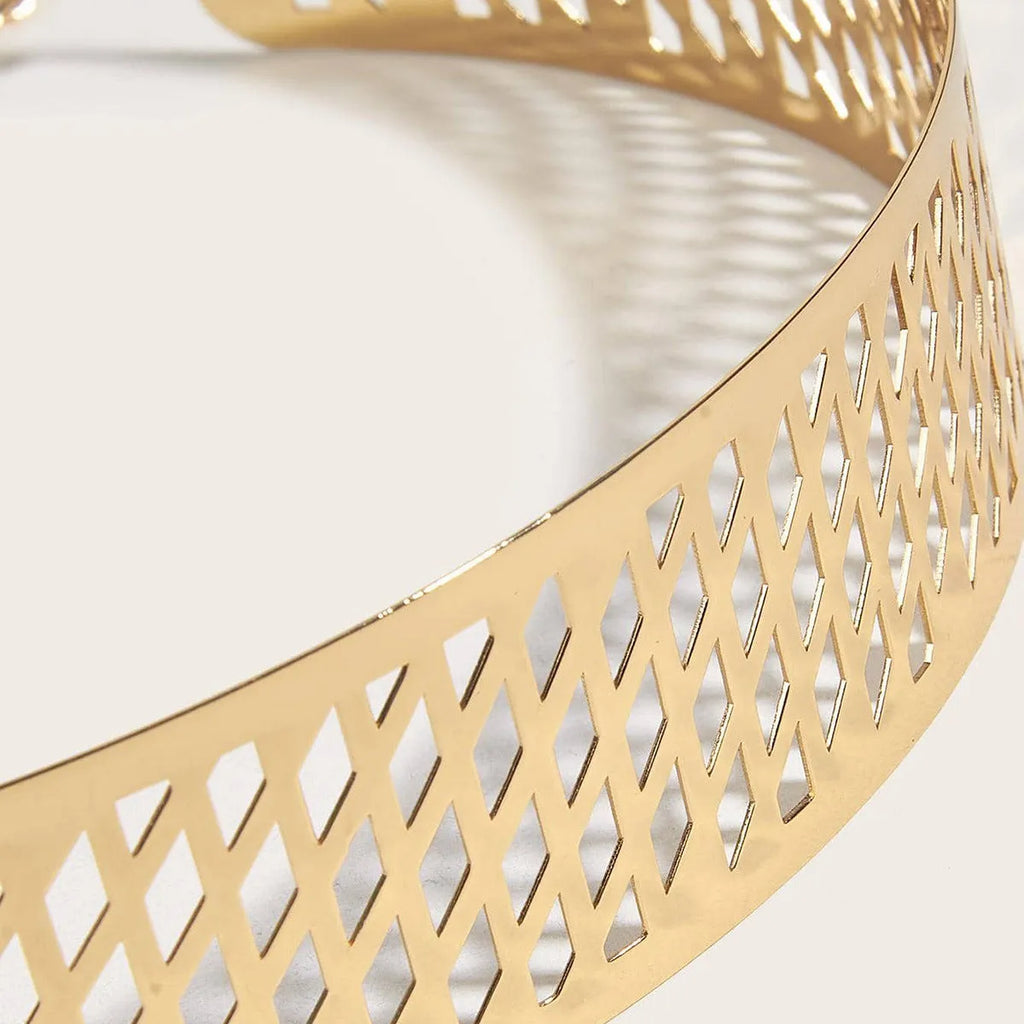 Golden alloy waist belt with lantern and floral punch net design, shown fastened, highlighting its 4.5cm width.