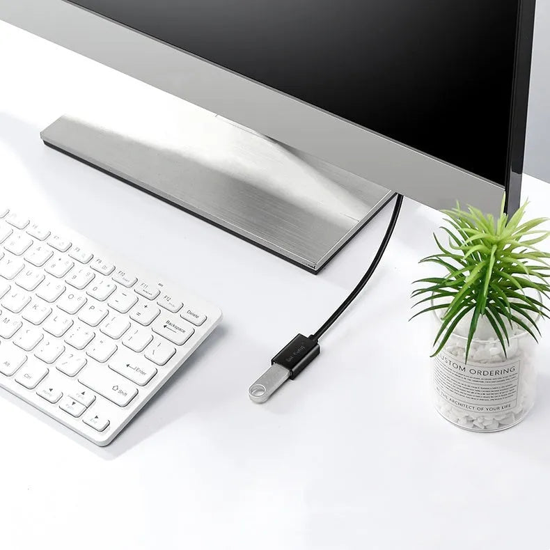 Black USB extension cable with male and female connectors, showing different length options available.