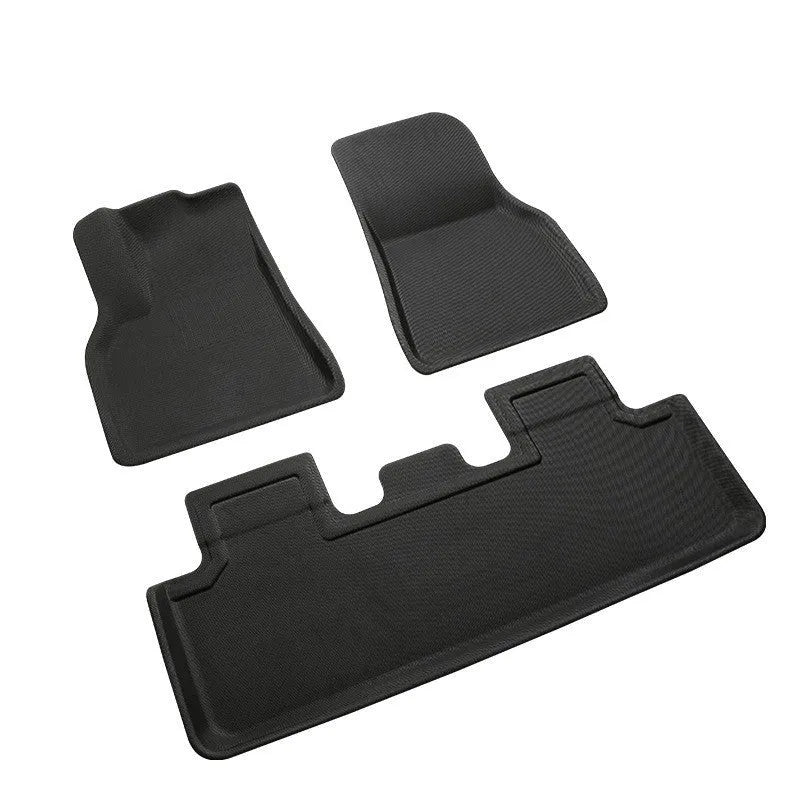 Tesla Model Y custom TPR floor mats showing foot mats, front storage box mat, and tailbox mats