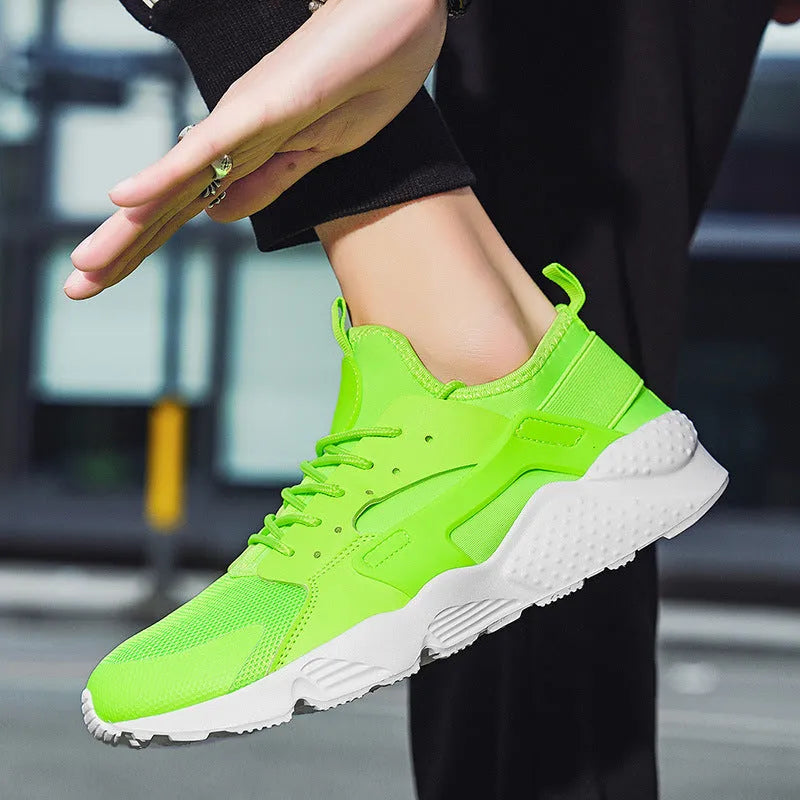 Men's mesh low top casual shoes in fluorescent red with lace-up closure and cross shoulder straps