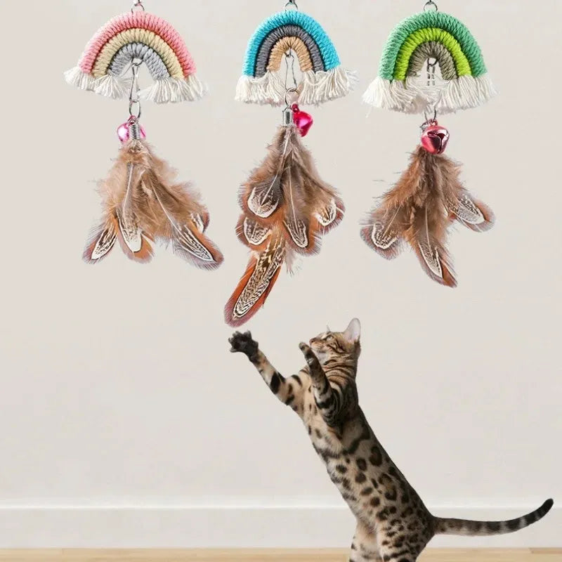 Blue feather cat rope toy hanging from door with elastic swing design and sticky buckle clamp