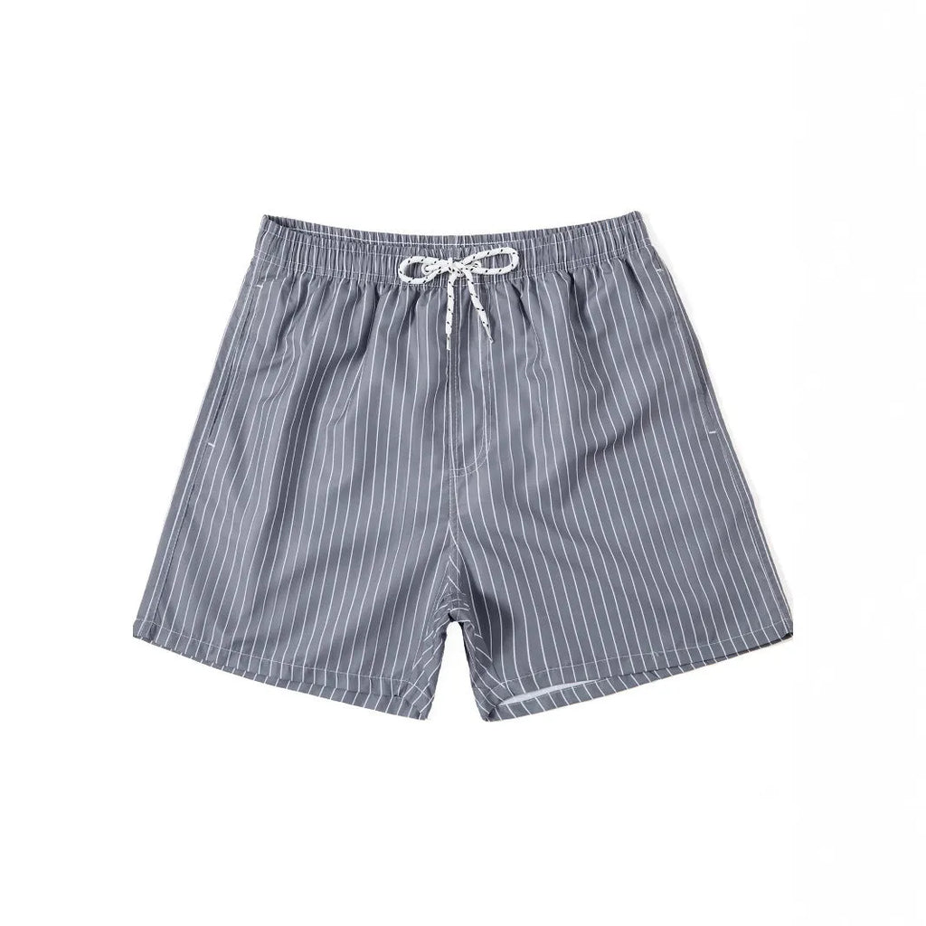 Navy blue striped beach shorts with straight leg opening and triangle lining, flat lay.