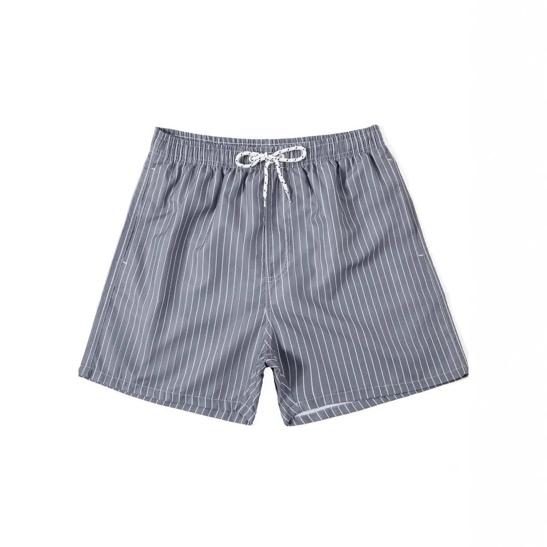 Navy blue striped beach shorts with straight leg opening and triangle lining, flat lay.