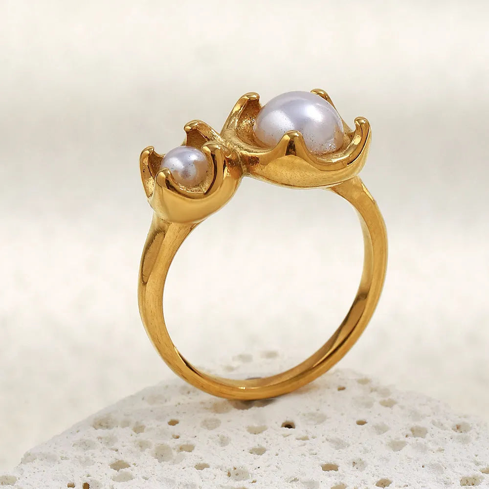 Gold stainless steel ring for women with bud imitation pearl and flower geometric design, sizes No 6 to No 8