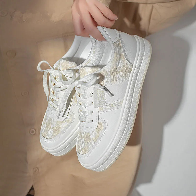 Beige plaid leisure sports shoes with a round toe and lace-up front, showing the rubber sole.
