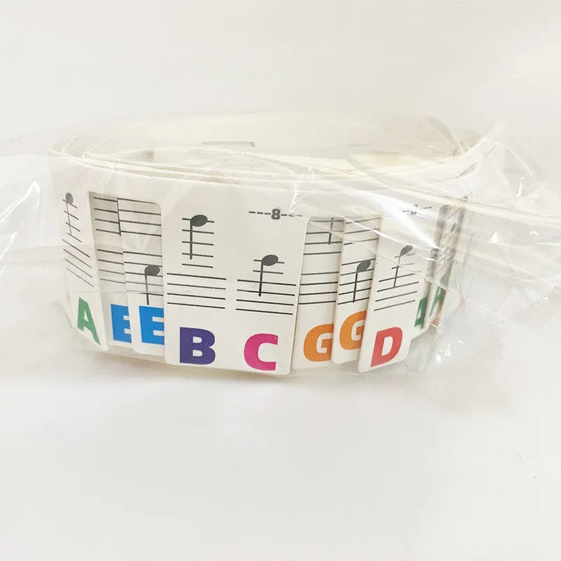 Piano keyboard note bar stickers showing colour-coded and black note options for 88-key learning