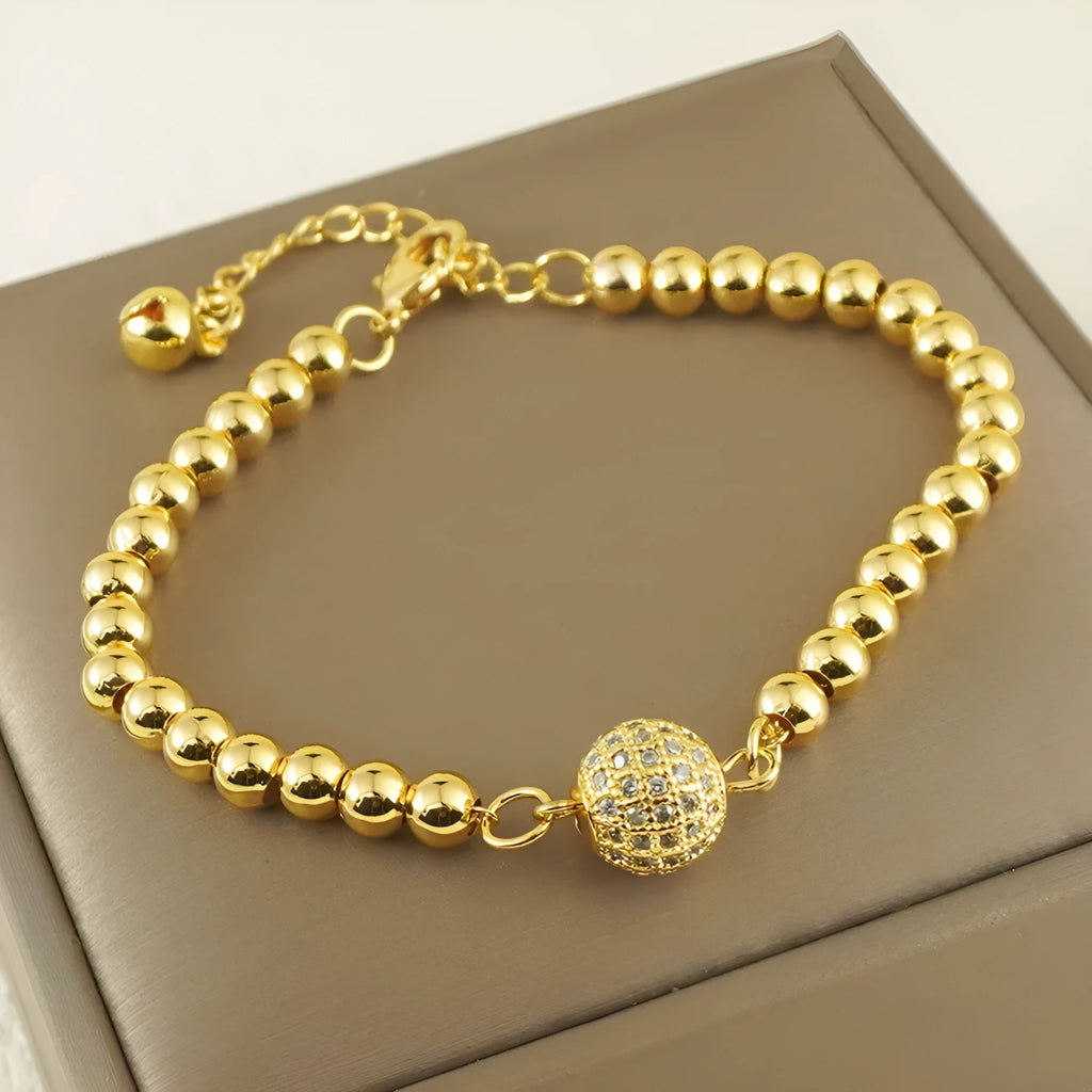 Women's copper bracelet with heart-shaped Arabic design and zircon stone detailing