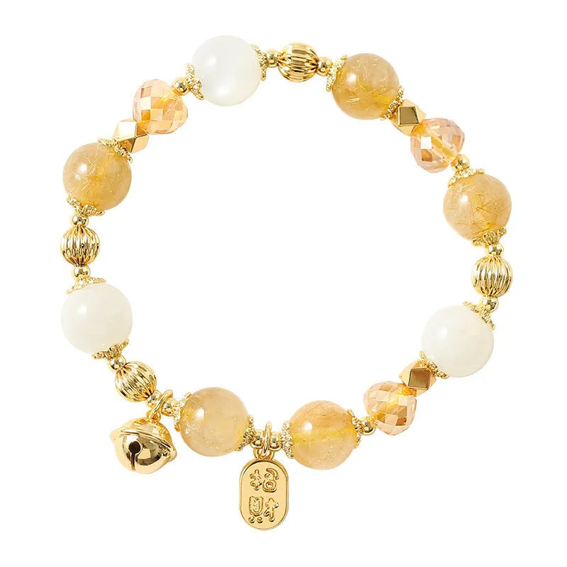 Gold coloured rutilated quartz crystal bracelet with electroplated finish in Korean style.