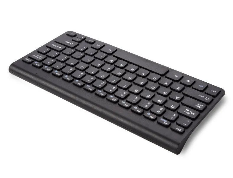 Black and white wireless keyboard and mouse set with USB receiver on desk