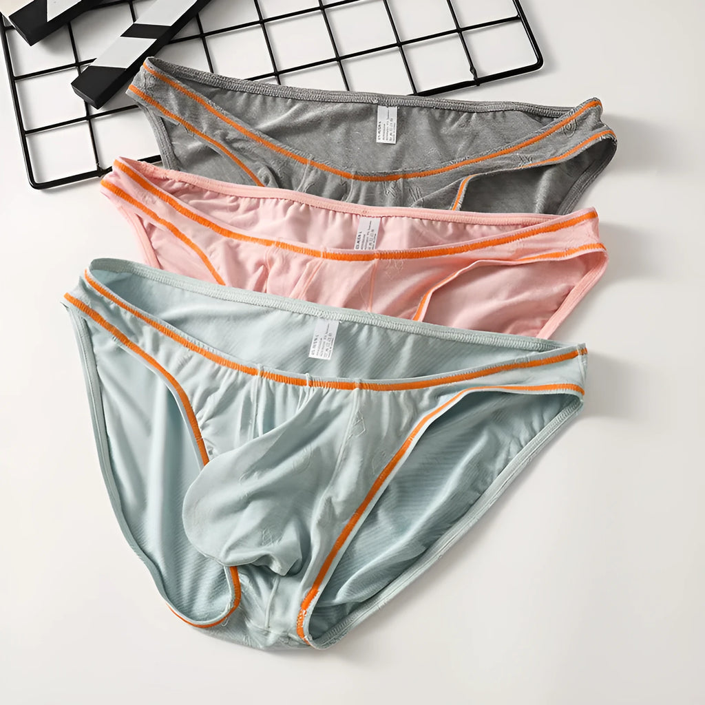 Men's dark grey modal ice silk butt-lift underwear laid flat.