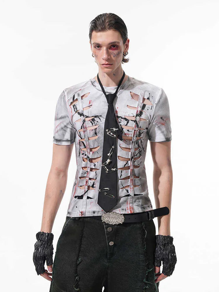 Man modelling a white men's short sleeve cotton t-shirt with a hollow-out cut design on the front.