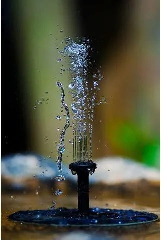 Black solar-powered floating garden fountain with multiple spray nozzles for birdbaths and ponds